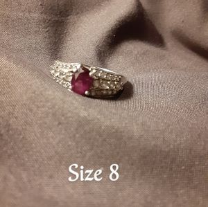 Silver diamond and amethyst ring.